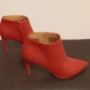 Light red/peach colored high heel bootie